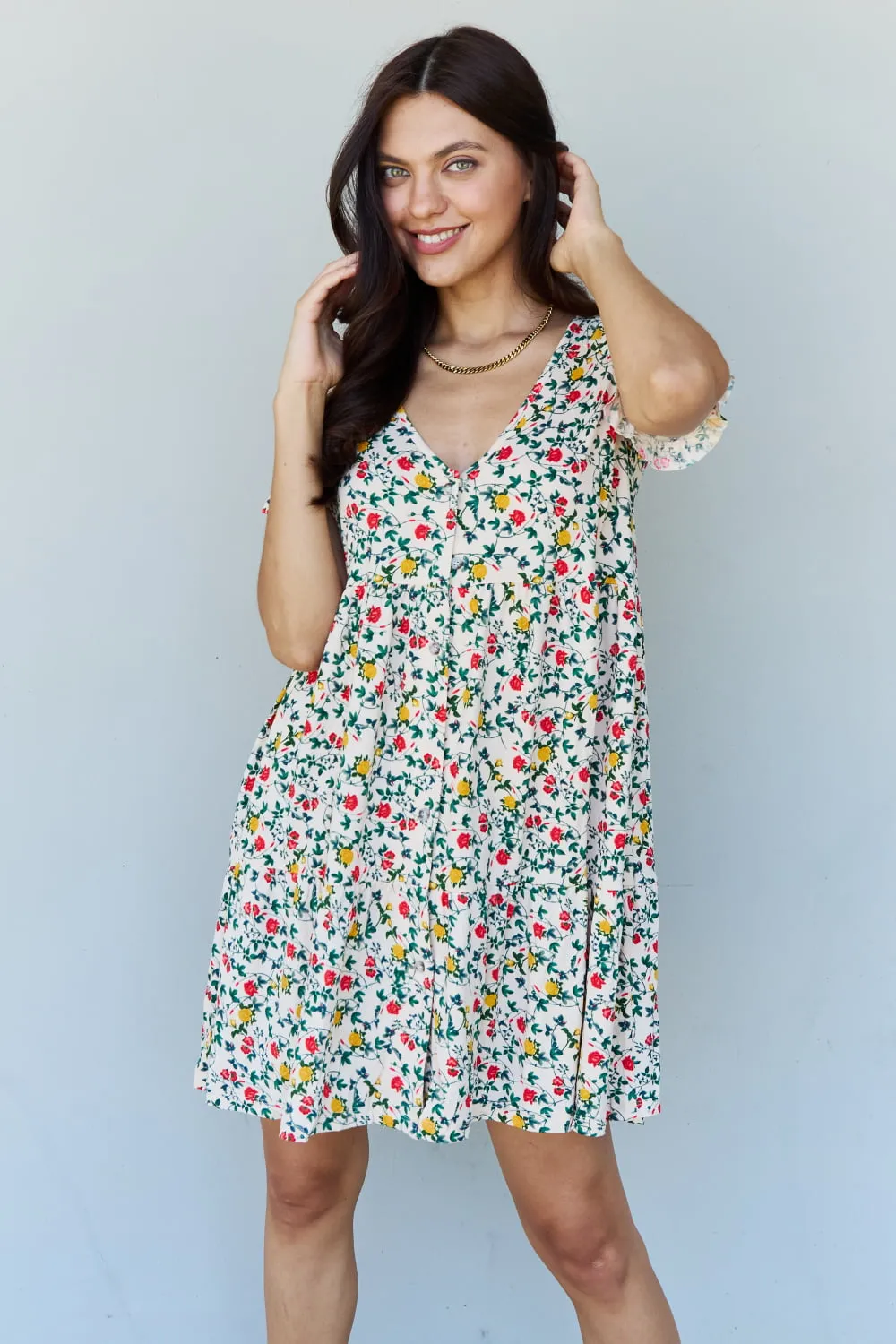 Follow Me Full Size V-Neck Ruffle Sleeve Floral Dress